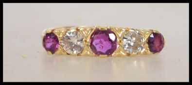 A hallmarked 18ct gold, ruby and diamond ring set