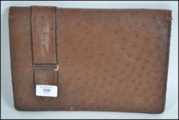 A vintage 230th century Ostrich skin / leather clu