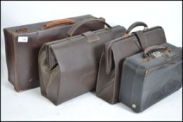 Two vintage 20th century leather Gladstone style b