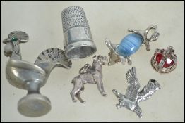 A group of silver and other fobs and seals to incl