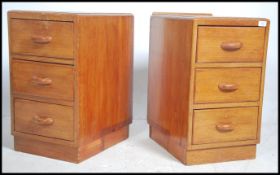 A pair of vintage mid century oak  G plan bedside