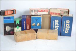 A collection of vintage mid 20th century projector / photographic bulbs to include Atlas, Mazda,