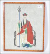 A Chinese 19th century print with handpainted finish of an ancestor with temple dog to feet on