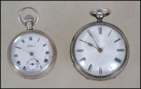 A silver hallmarked pocket watch together with an