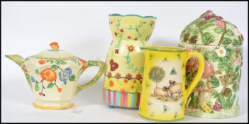 A collection of ceramic items to include an Art De