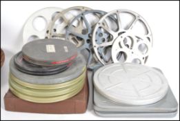 A collection of vintage 16mm films within cans. Fi