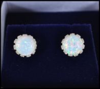 A pair of silver and large opal stud earrings comp