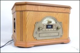 A vintage style wooden cased record player with hi