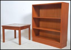 A 1970's teak wood and tile top square occasional