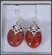 A pair of ladies contemporary silver and apple cor