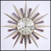 A mid century retro Metamec ' Starburst ' wall clo