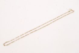 An 18ct gold ladies necklace of elongated chain li