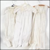 A small collection of vintage possibly 19th and 20th century Christening gowns. Please see images.