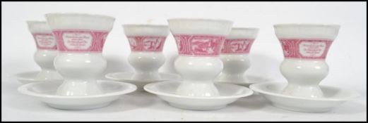 A collection of six ceramic Bavarian cups and sauc
