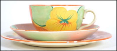 A Clarice Cliff 1930's Art Deco ceramic trio in th