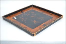 A large square Chinese laquered chinoserie and specimin veneer card table tray. Of square form