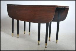 A 1970's G-Plan tola wood retro drop leaf dining t