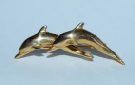 A hallmarked 9ct gold figural brooch in the form o