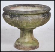 A large campana marble urn raised on square plinth