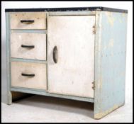 A mid century retro metal kitchen cabinet. The cab