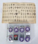 A collection of vintage and retro fabric Boy Scout badges from around the world together with a