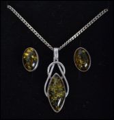 A ladies silver 925 pendant and necklace with matc