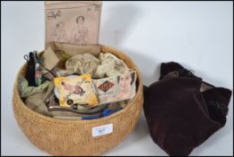 A collection of vintage 20th century sewing items,