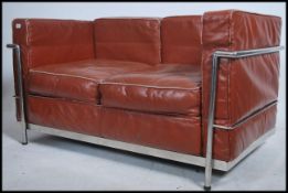 After Le Corbusier. An early 'LC2 ' type red / tan