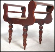 An antique style bergere caned hardwood window sea