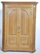 An early 19th century Georgian solid oak hanging c