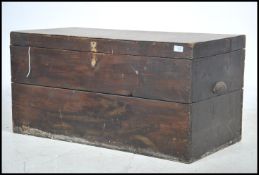 An early 20th century oak blanket box chest having