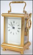 A 20th Century brass cased carriage timepiece, the
