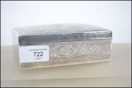 An Egyptian silver table top cigarette box chase d