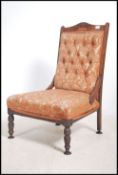An Edwardian mahogany ladies nursing chair / armch