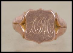 A hallmarked 9ct gold signet ring having central a