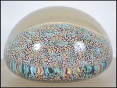 A stunning micro millefiori paperweight measuring 9cms diameter