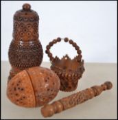 A collection of early 20th century carved coquilla