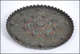 A 19th century Anglo Indian tray of handbeaten for