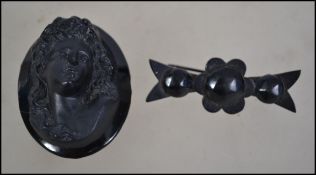 Two early 20th century mourning brooches with c cl