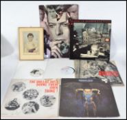 A small collection of vinyl lp records together wi