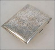 A silver hallmarked chase decorated cigarette case