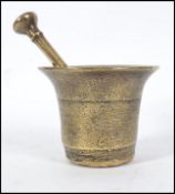 A good heavy  18th century bronze pestle and bell