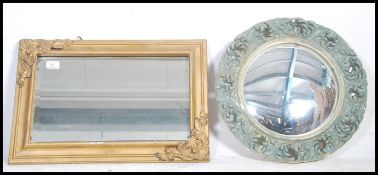 A vintage style 20th century convex mirror with ba