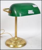 A vintage 20th century brass based bankers lamp ha