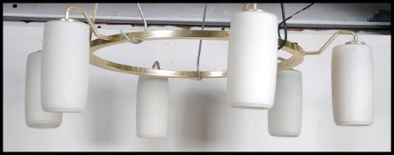 A set of retro style polished ceiling chandeliers