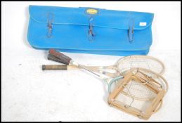 A vintage Dunlop tennis racket complete in the rar