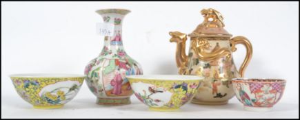 A collection of Chinese and Japanese decoration dating from the 19th century to include tea bowls,