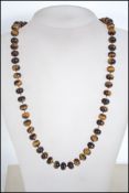 A 20th century ladies agate stone bead carved neck