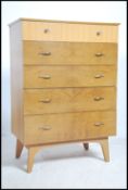 A 20th century retro straight chest of drawers on