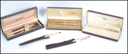 A good group of vintage rolled gold pens to includ